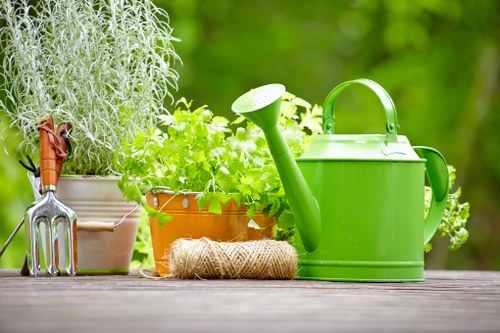 Close-up of a gardener assessing turf and plants